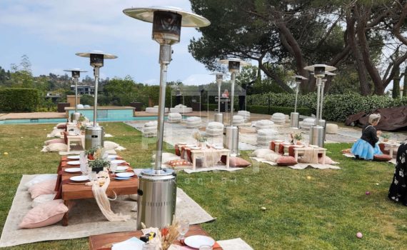 Silver Patio Heaters setup for Backyard Event